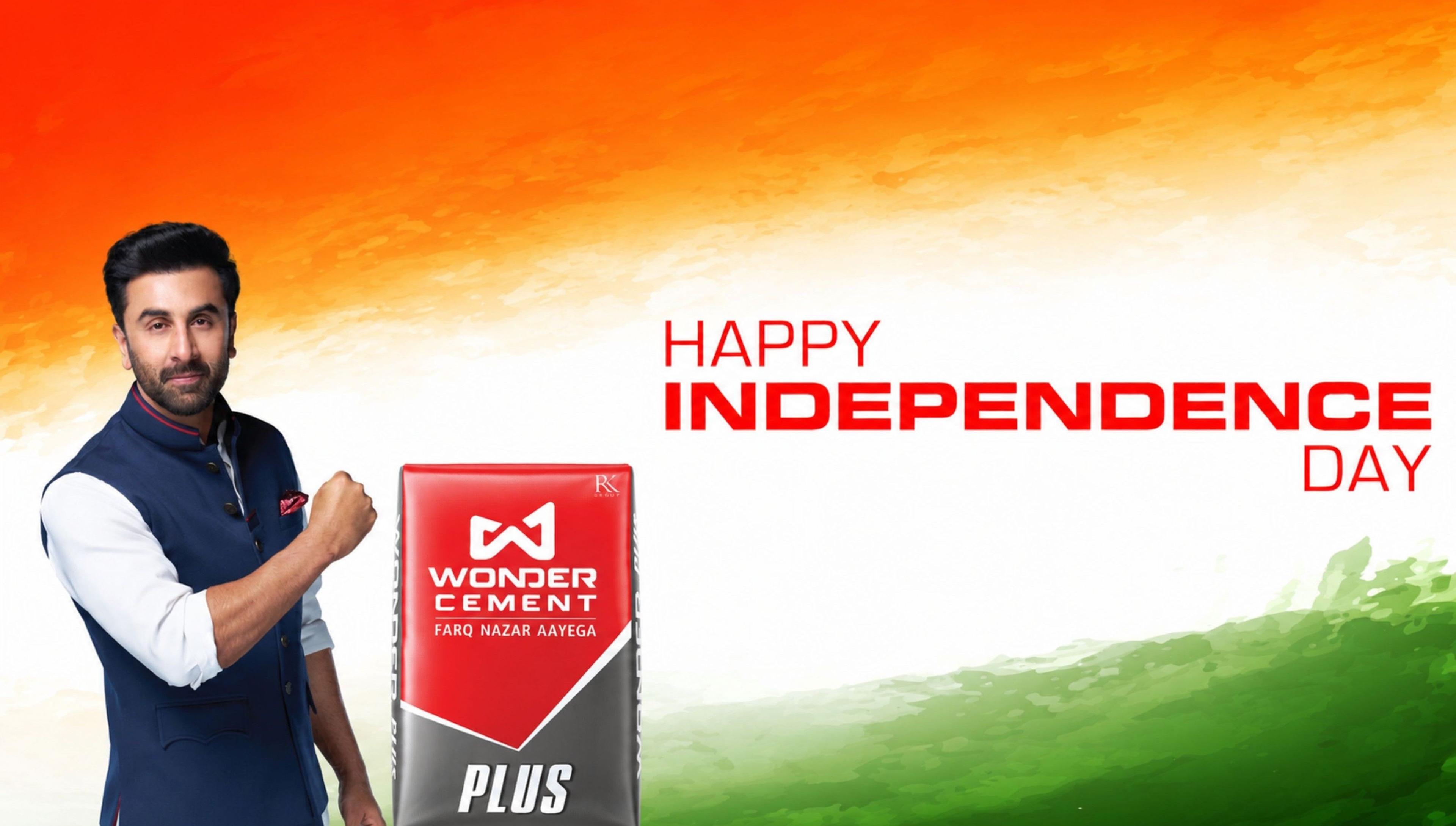 Ranbir Kapoor with Wonder Cement bag against Indian flag colors, wishing Happy Independence Day.