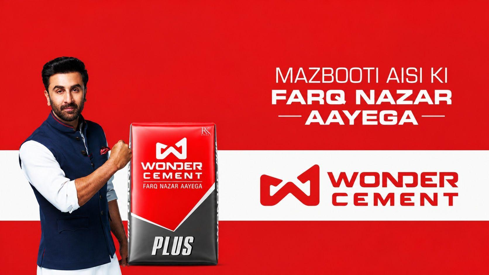 Actor Ranbir Kapoor stands with a Wonder Cement Plus bag, promoting its strength.