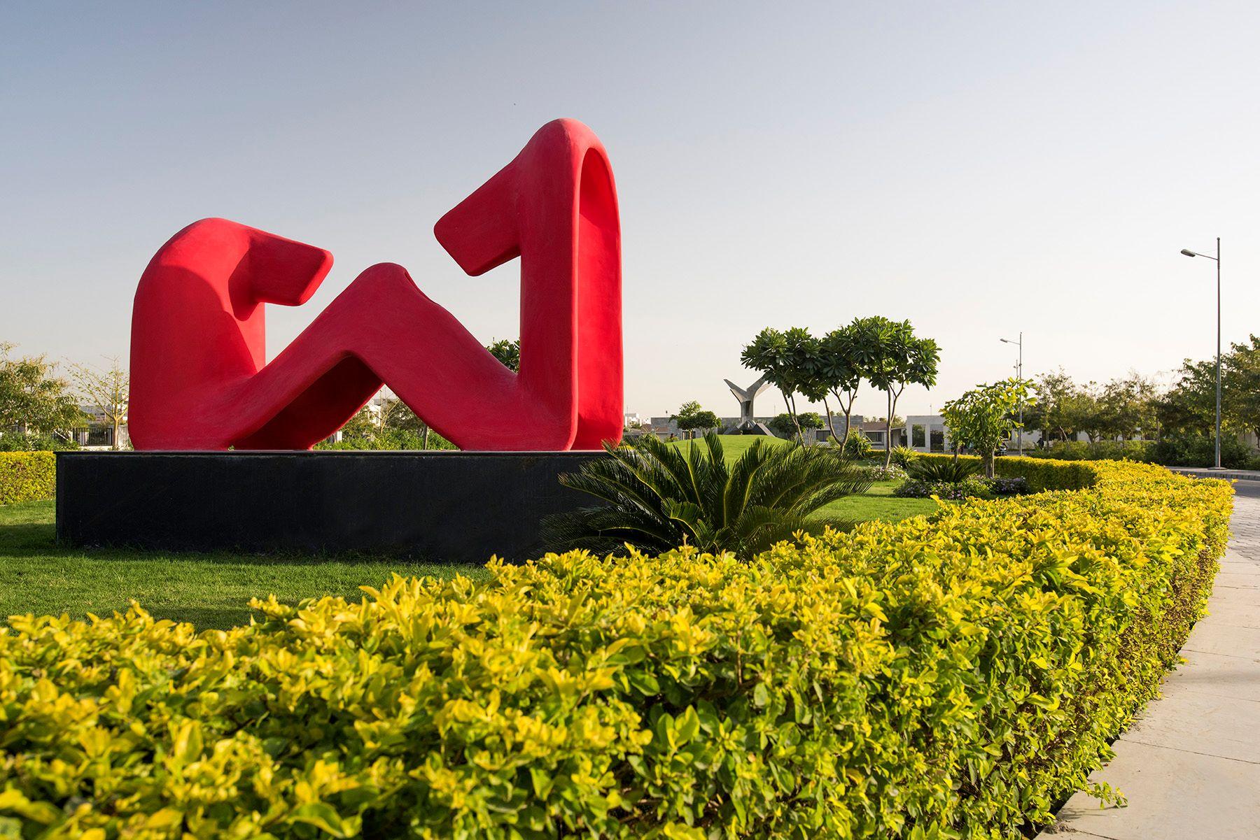 Wind energy and green landscape representing sustainable operations